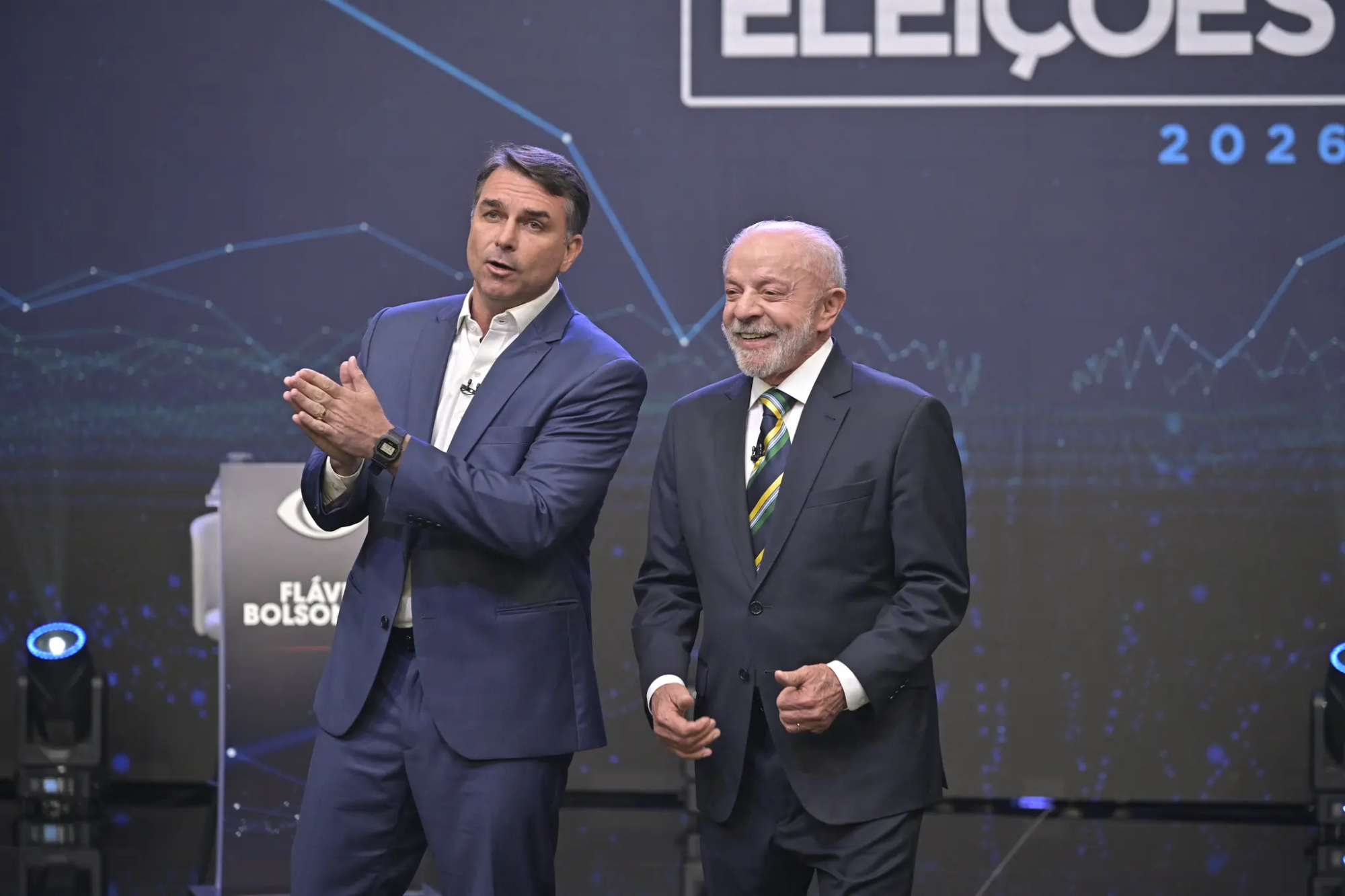1792416087-flavio-bolsonaro-e-lula-no-debate-da-band-scaled